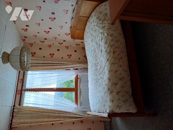 A OUTREAU, une maison d'habitation et son terrain.