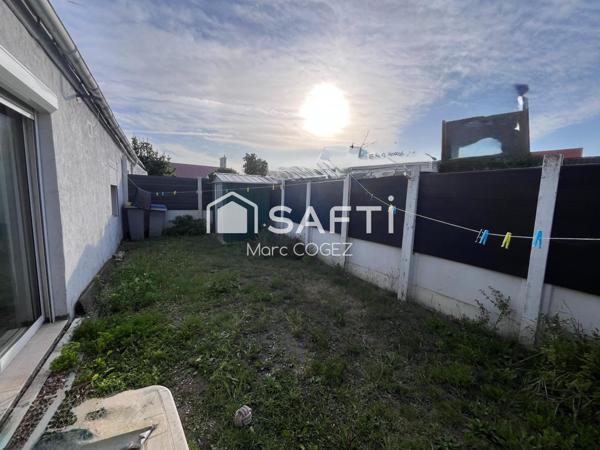 maison de plain pied avec jardin et stationnement privé. Aucun travaux à prévoir