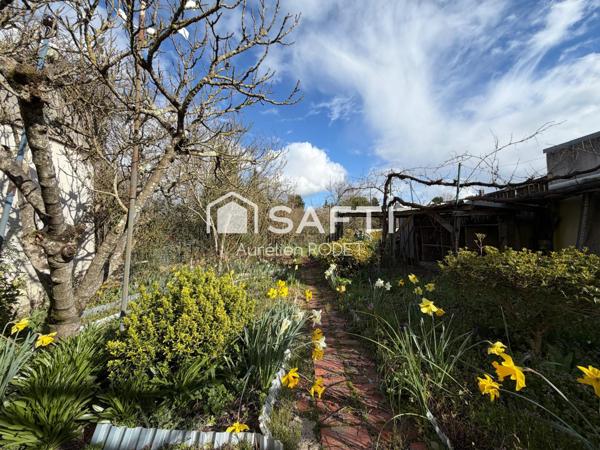 Maison de ville, quartier calme.