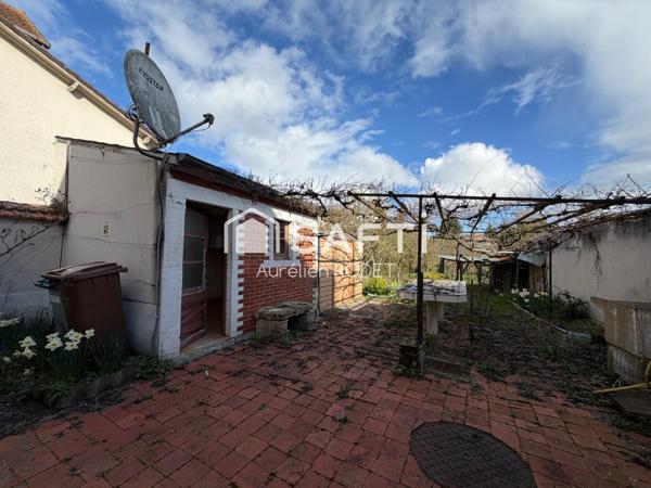 Maison de ville, quartier calme.