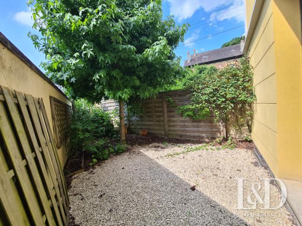 BEL APPARTEMENT AVEC JARDIN