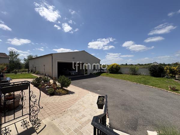 Pavillon avec Hangar de 150m²