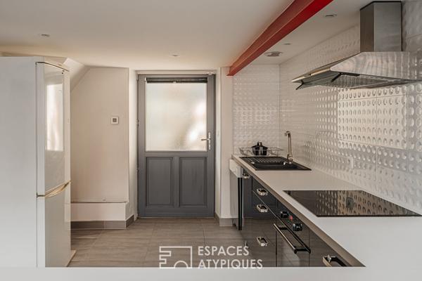 Appartement loft en duplex et petite terrasse coté cour 77 m2