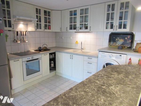 F3 de 73 m² en rez de jardin 