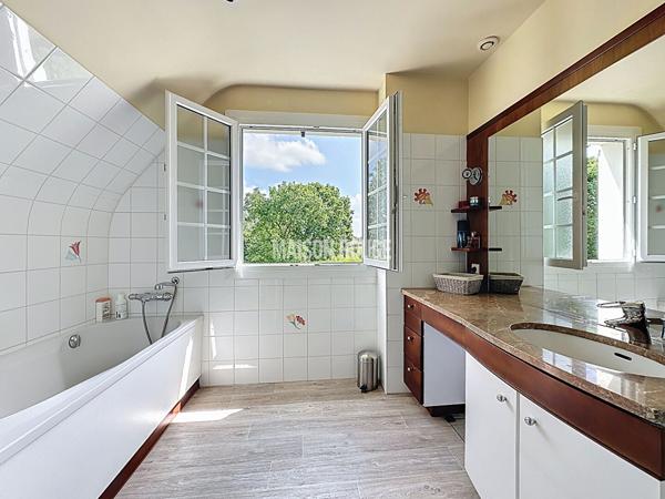 Maison éco-confort et raffinement : maison familiale avec piscine à Lannion