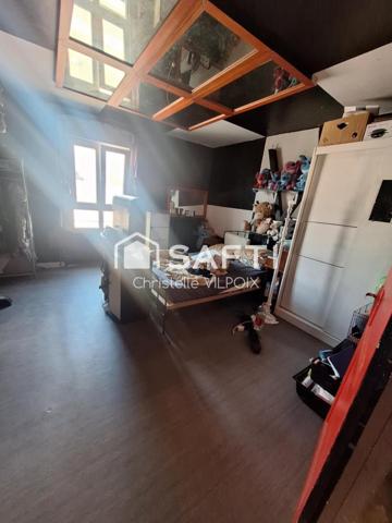 Maison individuelle de 309m² avec beau potentiel.