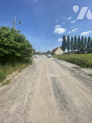 A VENDRE A AUBY TERRAIN A BATIR DE 555m²