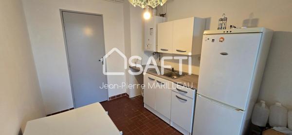 Appartement T2 avec loggia dans résidence sécurisée.