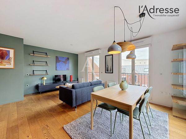 PUTEAUX/ Cours Voltaire - Appartement 2 pièces 62m² - 1 Terrasse - 1 Cave et 1 Parking
