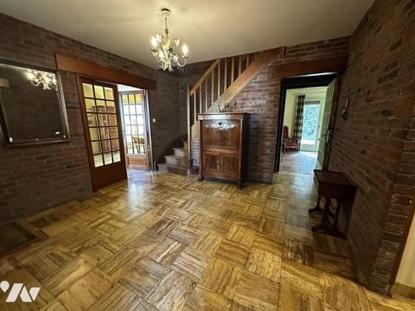 Maison familiale à fort potentiel – 1 105 m² de terrain