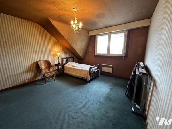 Maison familiale à fort potentiel – 1 105 m² de terrain