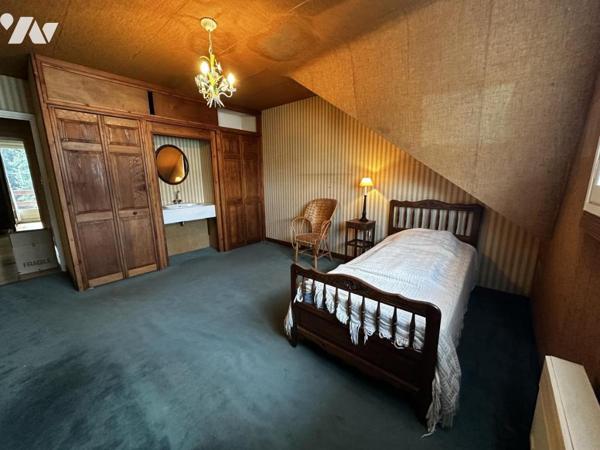 Maison familiale à fort potentiel – 1 105 m² de terrain