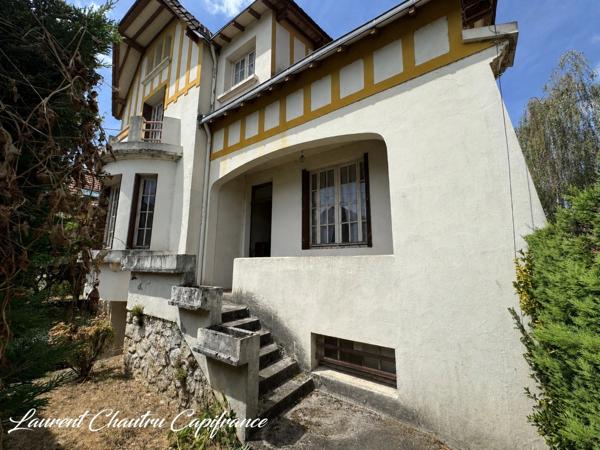 Maison de caractère avec jardin et garage