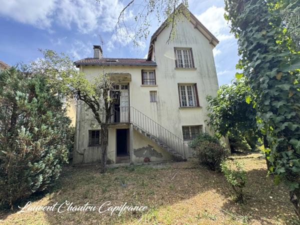 Maison de caractère avec jardin et garage