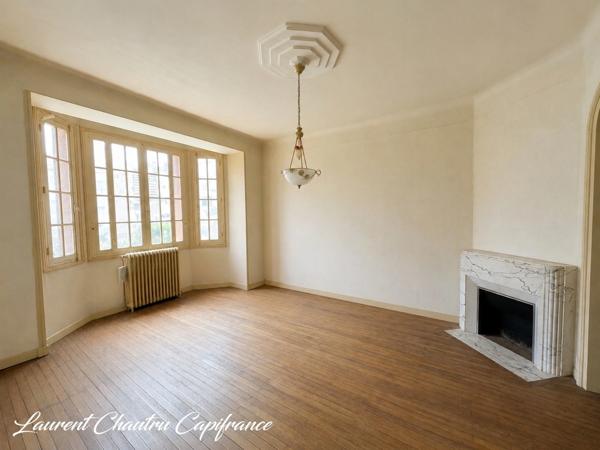 Maison de caractère avec jardin et garage