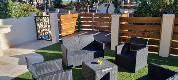 BAS DE VILLA T3, TERRASSE, JACUZZI ET STATIONNEMENT