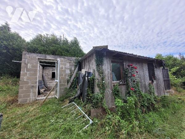 Terrain viabilisé avec bâtiment