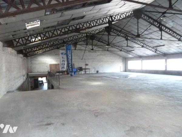 Ancien garage automobile à VENDRE à CAUDRY. 