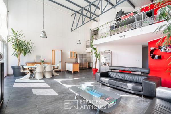 Maison type loft avec jardin