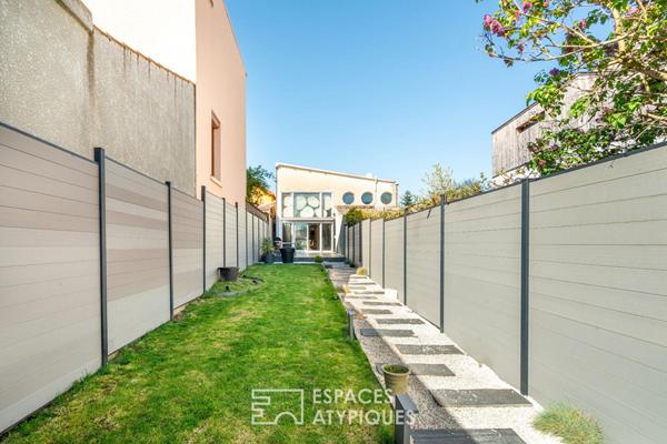 Maison type loft avec jardin