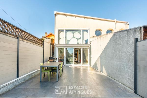Maison type loft avec jardin