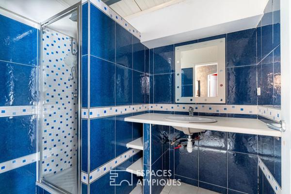 Maison type loft avec jardin