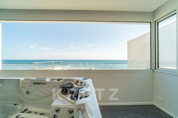 Villa d'exception en première ligne sur la plage