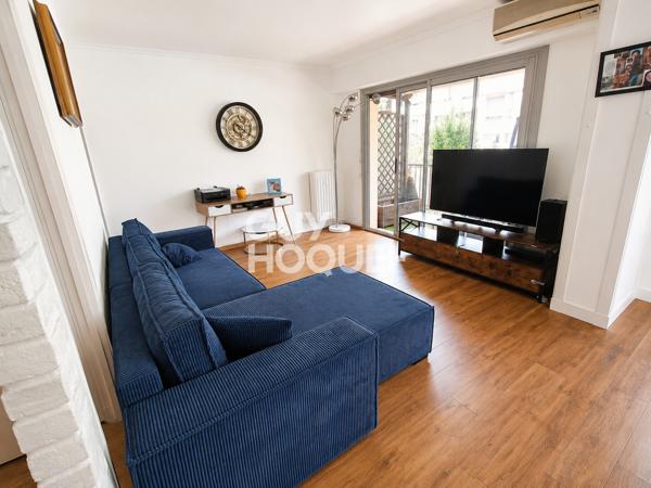 LE CANNET – Spacieux appartement avec terrasse, parking et fort potentiel