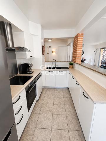 LE CANNET – Spacieux appartement avec terrasse, parking et fort potentiel