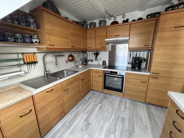 F3 de 64 m2 + une cave + 1 grand garage à HUNINGUE (68330)
