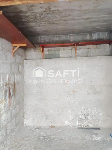 Garage situé dans copropriété sécurisée et fermée