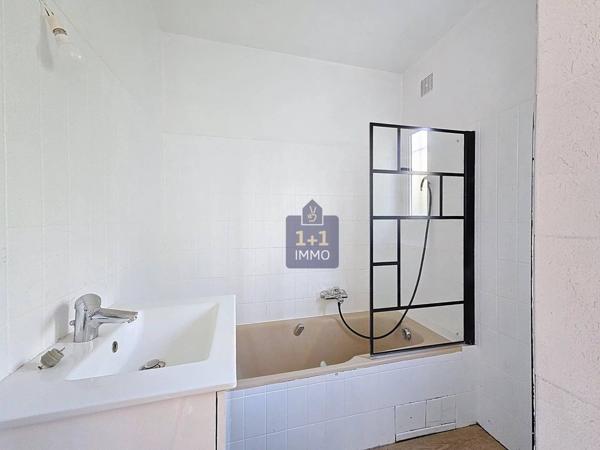 Maison avec jardinet