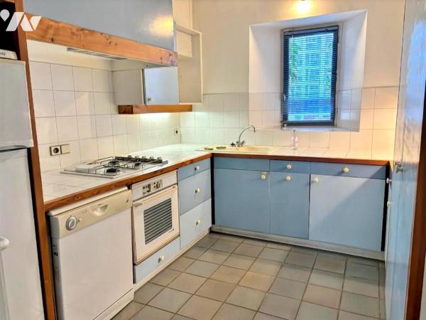 Appartement 6 pièces + C au cachet de l'ancien situé au cœur du centre ville