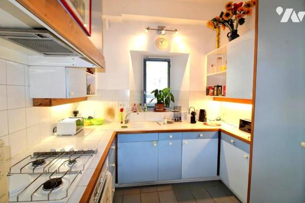 Appartement 6 pièces + C au cachet de l'ancien situé au cœur du centre ville