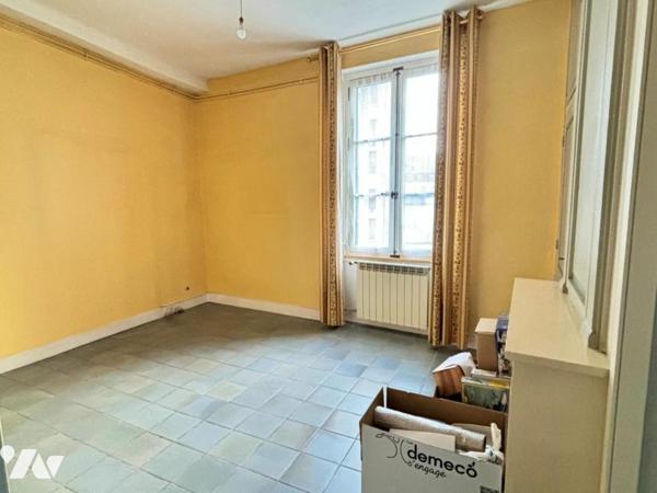 Appartement 6 pièces + C au cachet de l'ancien situé au cœur du centre ville