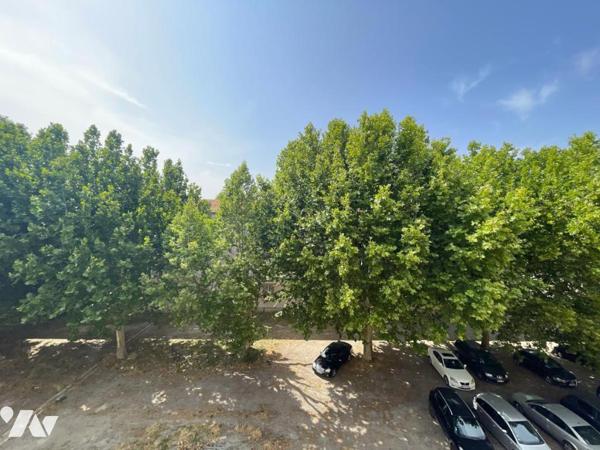 Appartement T4 avec balcon, garage et cave