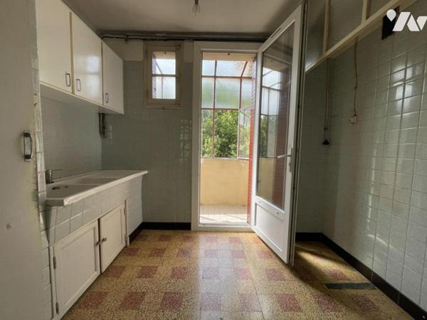 Appartement T4 avec balcon, garage et cave