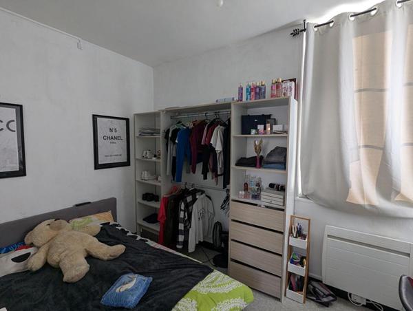 Immeuble de rapport: 2 appartements et local commercial