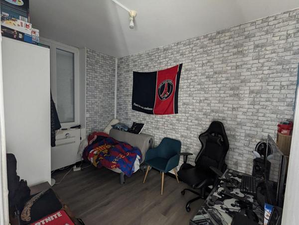 Immeuble de rapport: 2 appartements et local commercial