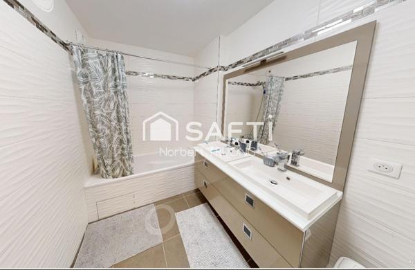 T 3 - 87,5 m² (67,16 Carrez) - TERRASSE/BALCON - CAVE - PARKING