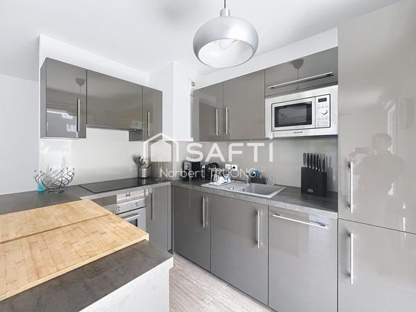 T 3 - 87,5 m² (67,16 Carrez) - TERRASSE/BALCON - CAVE - PARKING