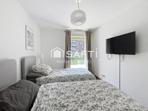 T 3 - 87,5 m² (67,16 Carrez) - TERRASSE/BALCON - CAVE - PARKING