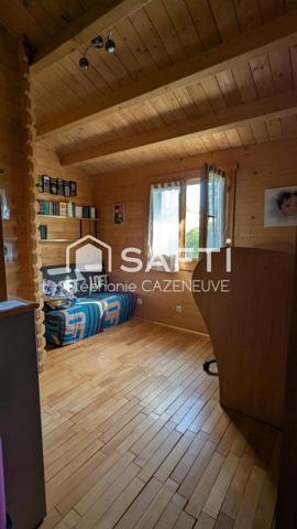 Maison en madriers de bois, charme et fonctionnalité