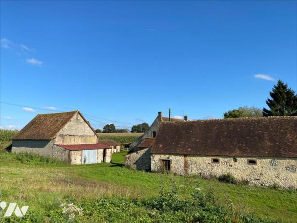 CORPS DE FERME avec  terrain d'environ 4ha8a