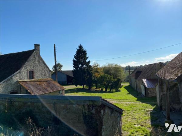 CORPS DE FERME avec  terrain d'environ 4ha8a