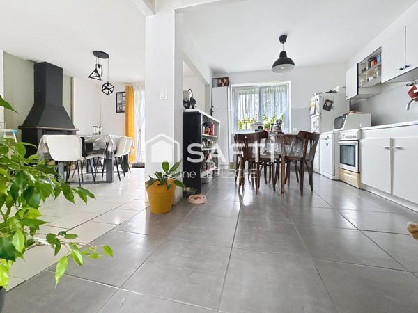 Maison avec jardin, garage et cave