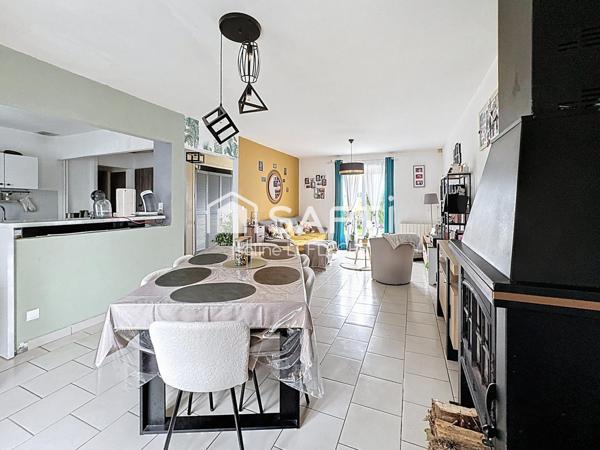 Maison avec jardin, garage et cave