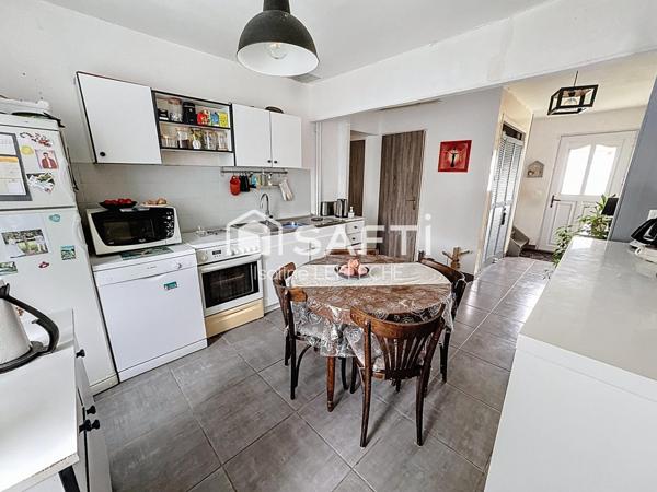 Maison avec jardin, garage et cave