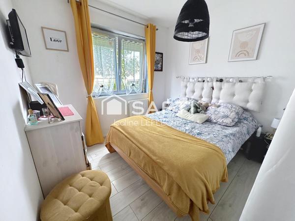 Maison avec jardin, garage et cave