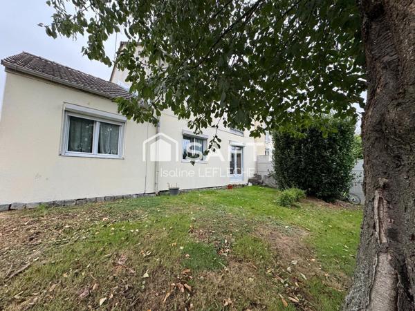 Maison avec jardin, garage et cave